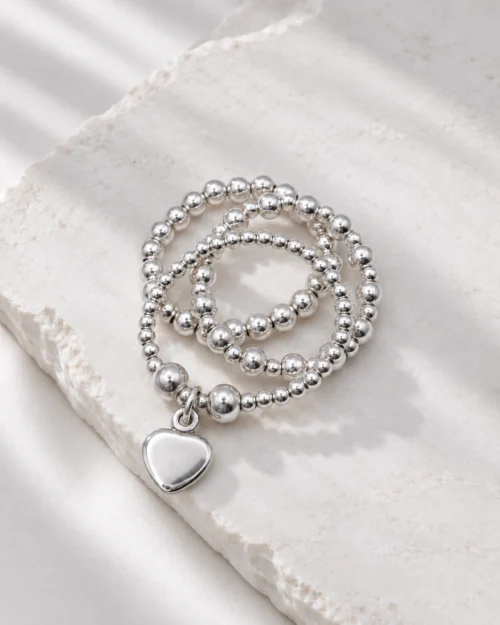 Set Trío Esencia de tres anillos de plata de ley 925, modelos Origen, Esfera y Duo, con charm de corazón